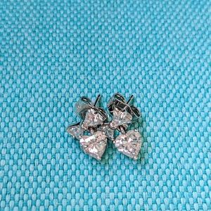 Bow and heart dangling earrings
